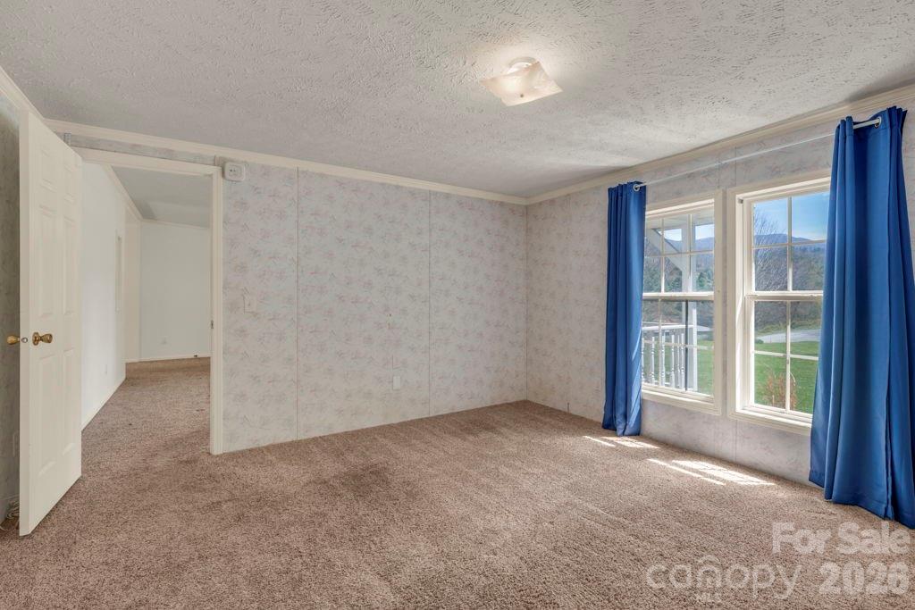 228 Vilas Overlook, Unit 1 Vilas, NC 28692 - Photo 30 of 48 a view of an empty room with a window