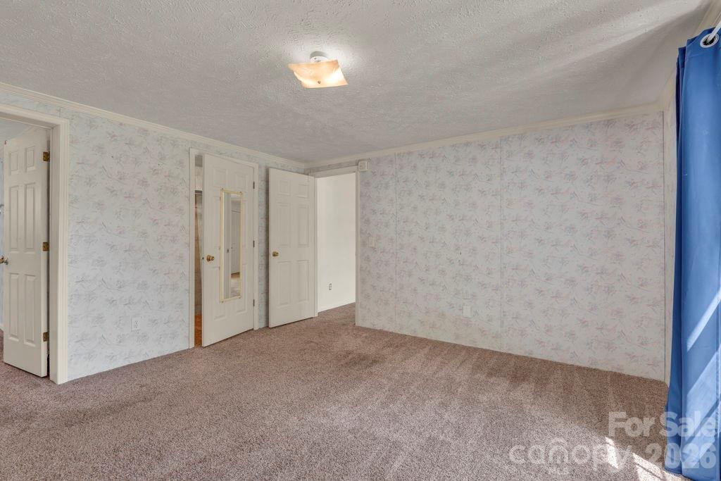 228 Vilas Overlook, Unit 1 Vilas, NC 28692 - Photo 31 of 48 a view of an empty room and a window