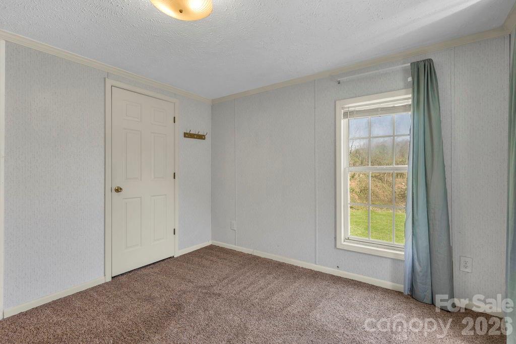 228 Vilas Overlook, Unit 1 Vilas, NC 28692 - Photo 35 of 48 a view of an empty room with a window