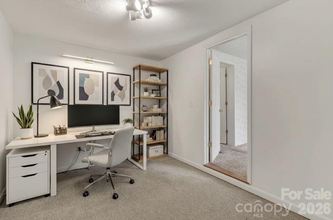 228 Vilas Overlook, Unit 1 Vilas, NC 28692 - Photo 43 of 48 a view of a workspace with furniture