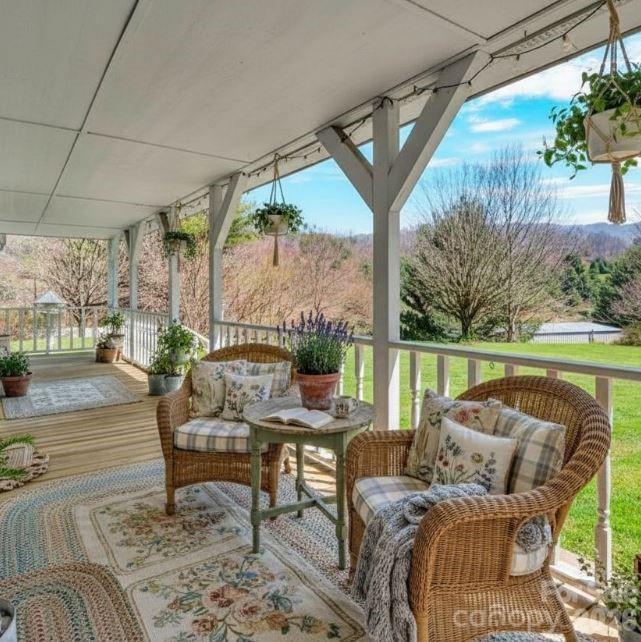 228 Vilas Overlook, Unit 1 Vilas, NC 28692 - Photo 5 of 48 a outdoor living space with furniture and outdoor view