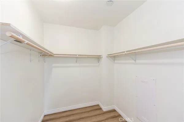 a view of an empty walk in closet