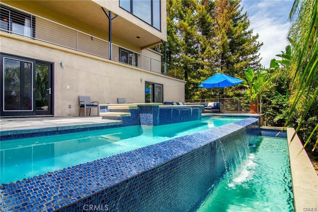 5084 Campo Road Los Angeles, CA 91364 - Photo 1 of 29 a view of a house with a yard