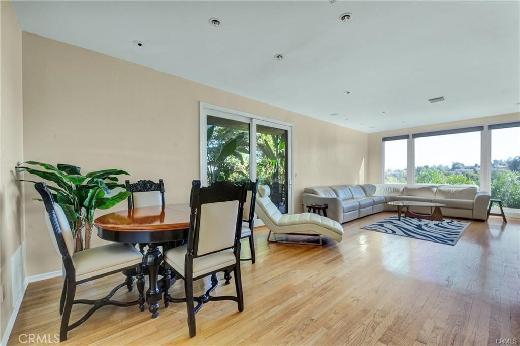 5084 Campo Road Los Angeles, CA 91364 - Photo 11 of 29 a living room with furniture and a large window