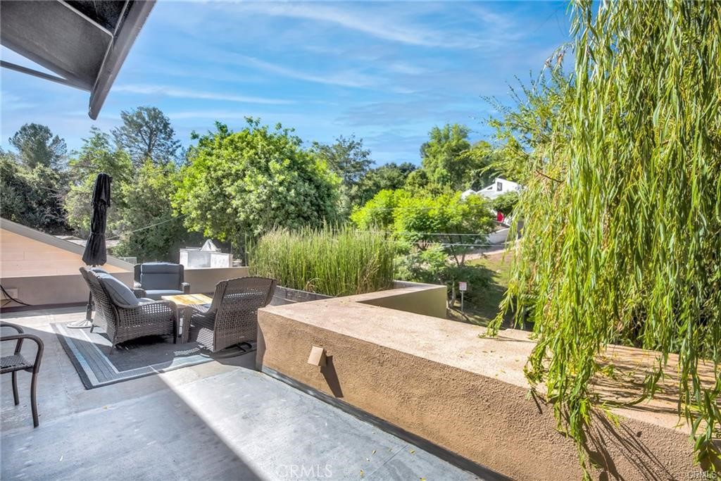 5084 Campo Road Los Angeles, CA 91364 - Photo 17 of 29 a view of yard with outdoor seating