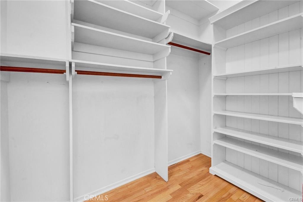 5084 Campo Road Los Angeles, CA 91364 - Photo 22 of 29 a view of walk in closet with empty racks