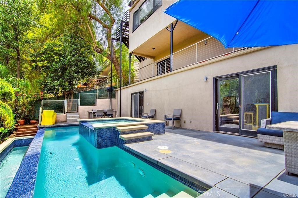 5084 Campo Road Los Angeles, CA 91364 - Photo 26 of 29 a view of a house with swimming pool