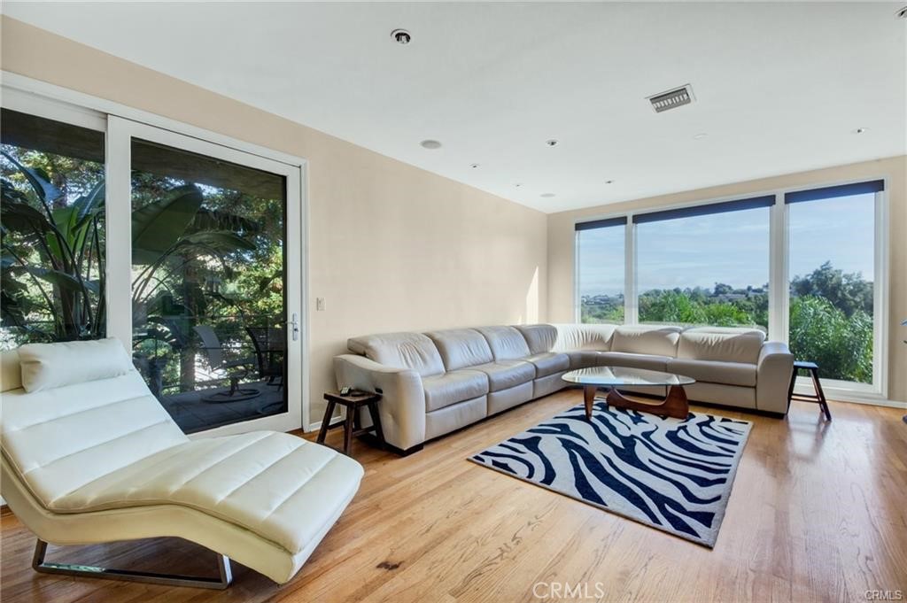 5084 Campo Road Los Angeles, CA 91364 - Photo 5 of 29 a living room with furniture and a large window