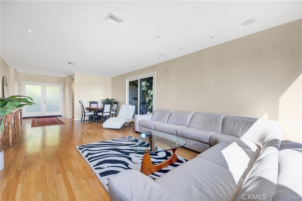 5084 Campo Road Los Angeles, CA 91364 - Photo 8 of 29 a living room with furniture and a wooden floor
