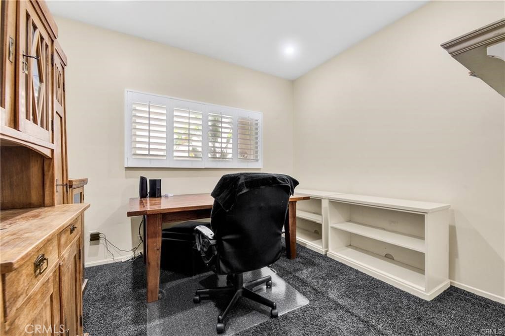 5084 Campo Road Los Angeles, CA 91364 - Photo 9 of 29 a view of a workspace with furniture and a window