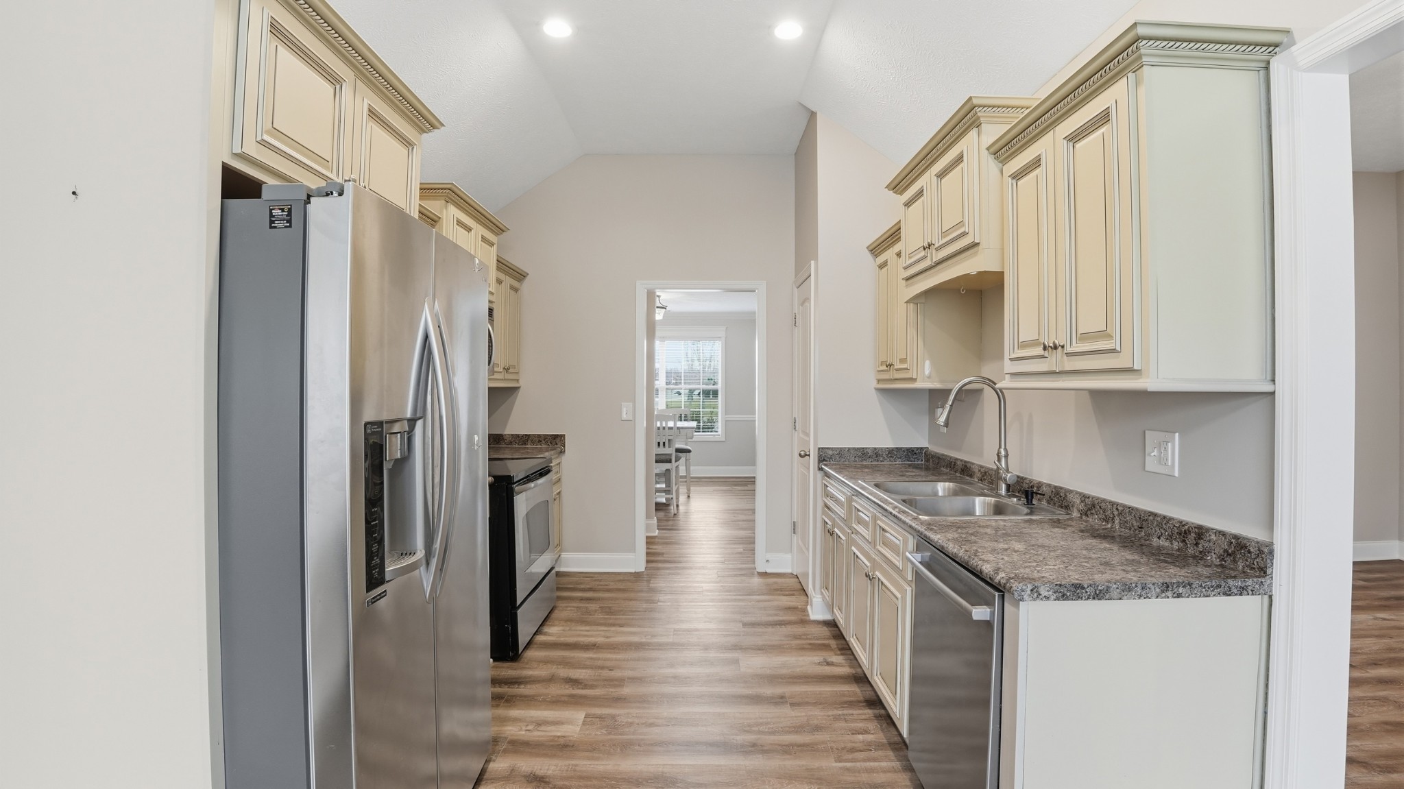 2422 Turtle Trace Murfreesboro, TN 37127 - Photo 14 of 38 a kitchen with stainless steel appliances granite countertop a refrigerator and a sink
