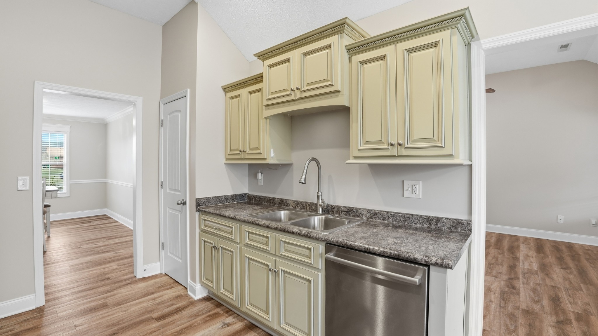 2422 Turtle Trace Murfreesboro, TN 37127 - Photo 15 of 38 a kitchen with granite countertop a sink and cabinets