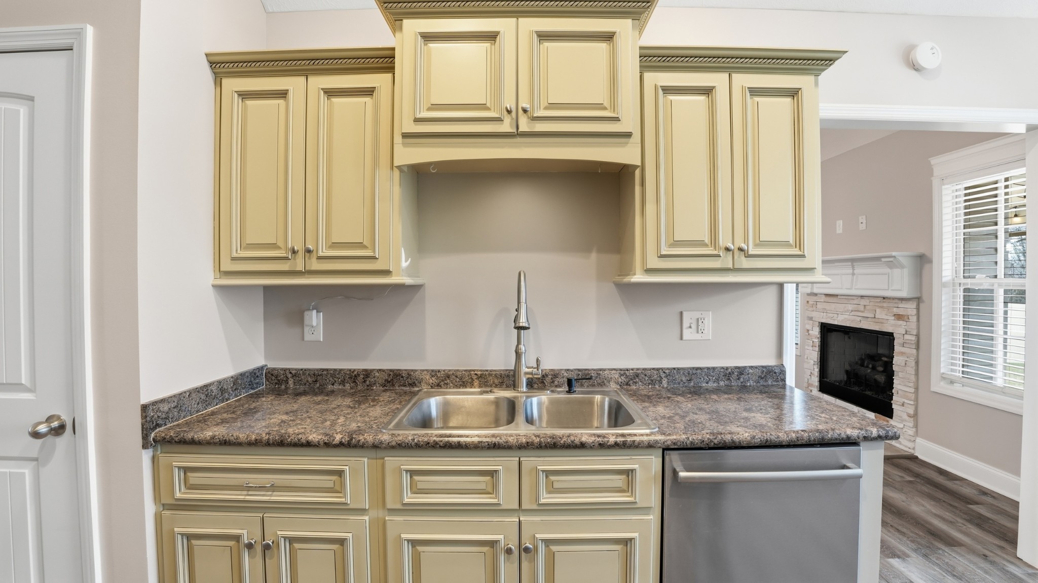 2422 Turtle Trace Murfreesboro, TN 37127 - Photo 16 of 38 a kitchen with granite countertop a sink and cabinets