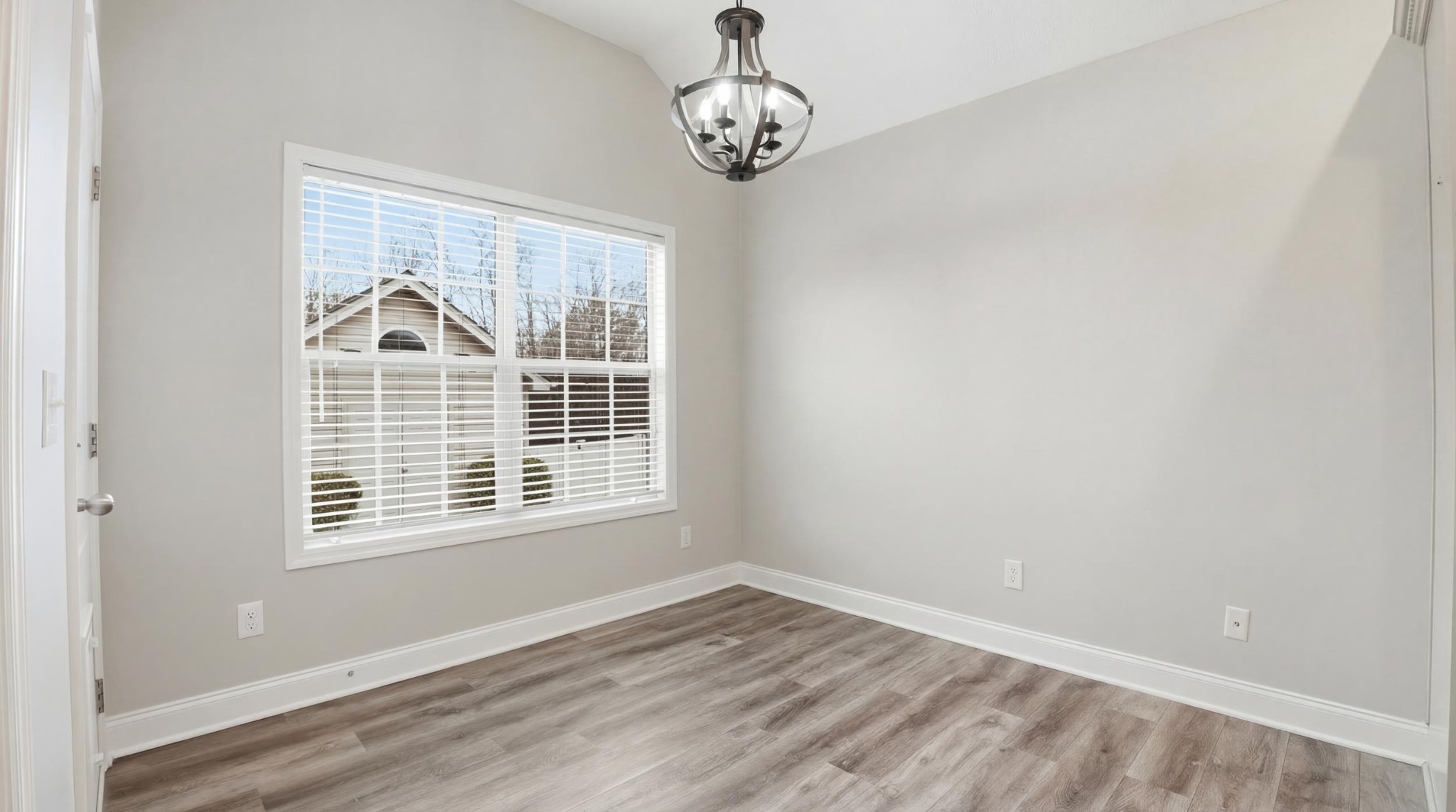 2422 Turtle Trace Murfreesboro, TN 37127 - Photo 17 of 38 a view of an empty room with wooden floor and a window