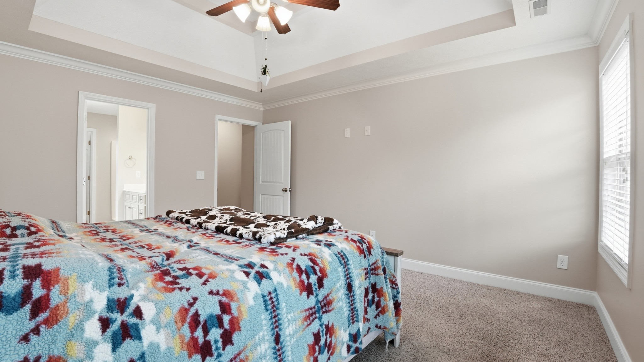 2422 Turtle Trace Murfreesboro, TN 37127 - Photo 20 of 38 a bedroom with a bed and a chandelier