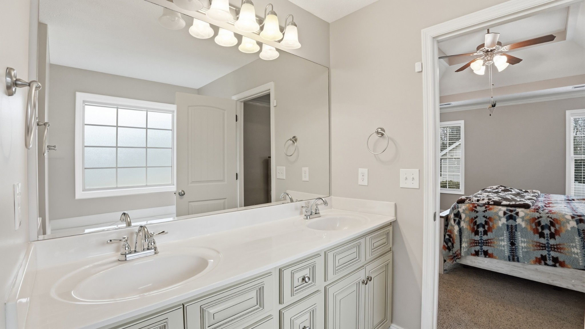 2422 Turtle Trace Murfreesboro, TN 37127 - Photo 21 of 38 a spacious bathroom with a double vanity sink a mirror and a shower