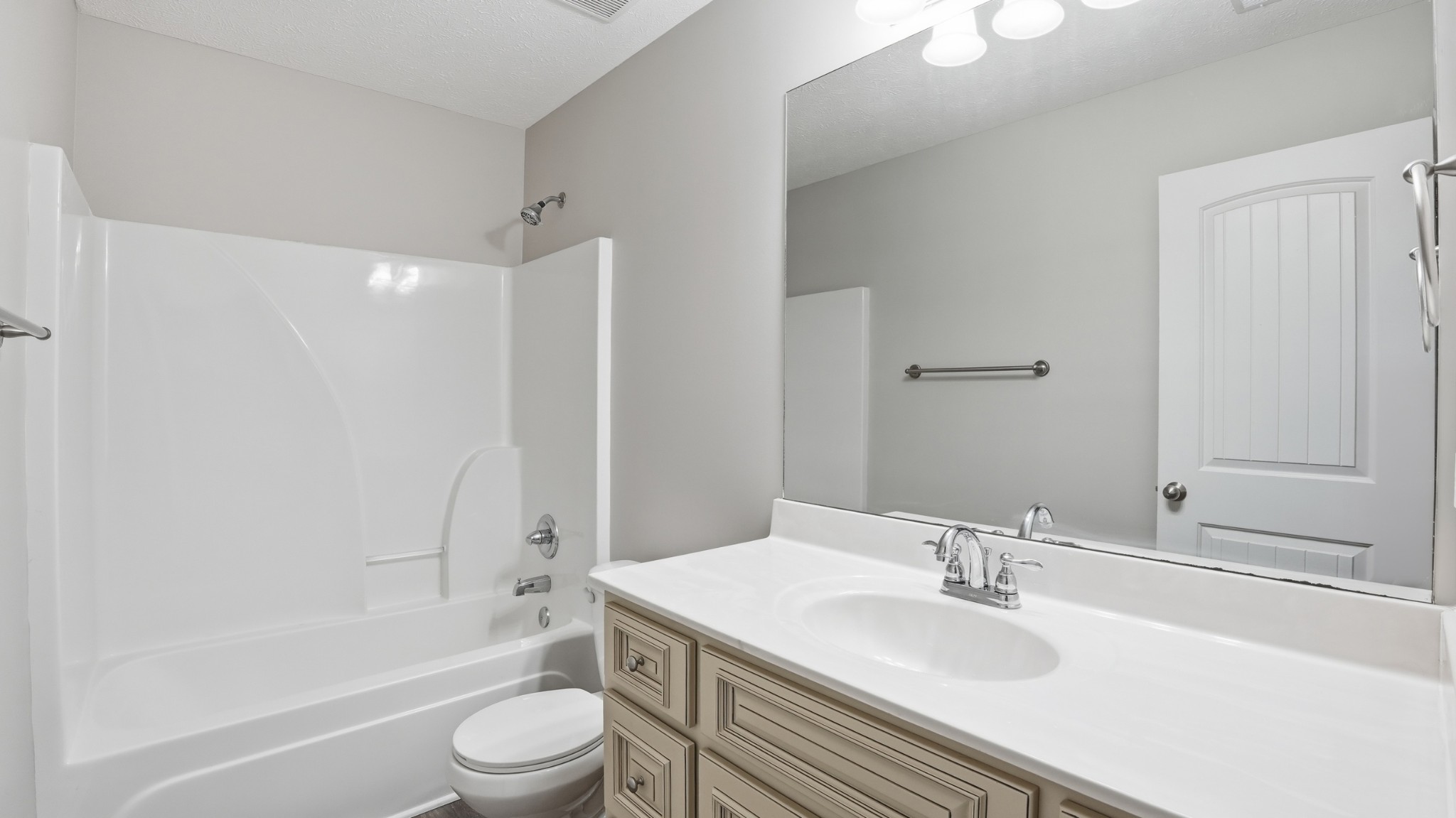 2422 Turtle Trace Murfreesboro, TN 37127 - Photo 27 of 38 a bathroom with a granite countertop sink toilet a mirror and shower