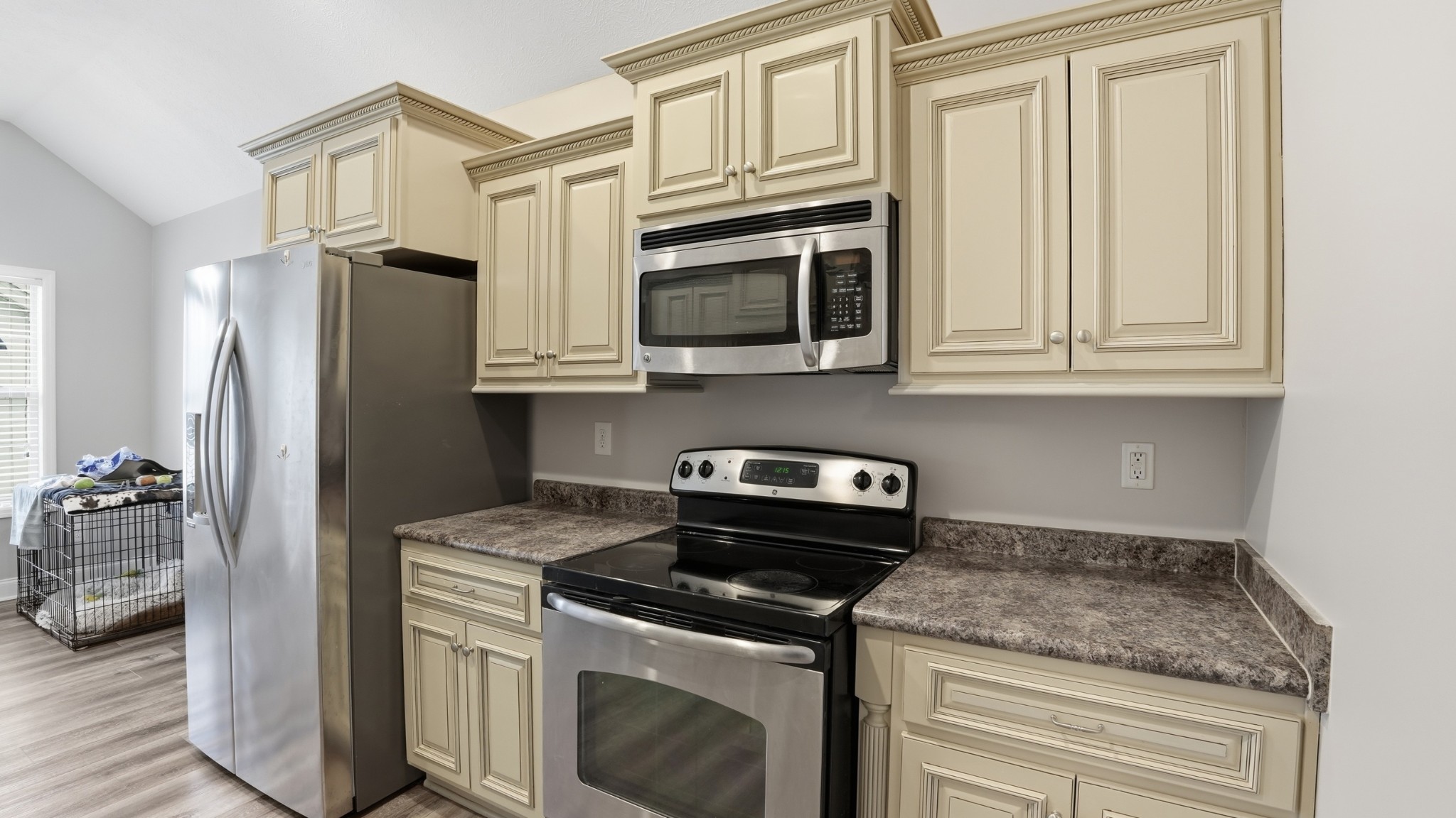 2422 Turtle Trace Murfreesboro, TN 37127 - Photo 3 of 38 a kitchen with stainless steel appliances granite countertop a refrigerator stove and cabinets