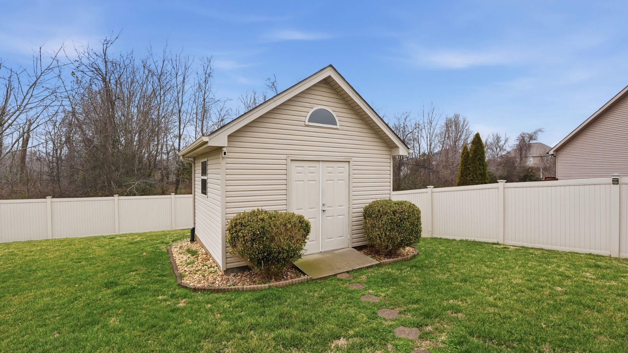 2422 Turtle Trace Murfreesboro, TN 37127 - Photo 32 of 38 a backyard of a house with a garden and barbeque