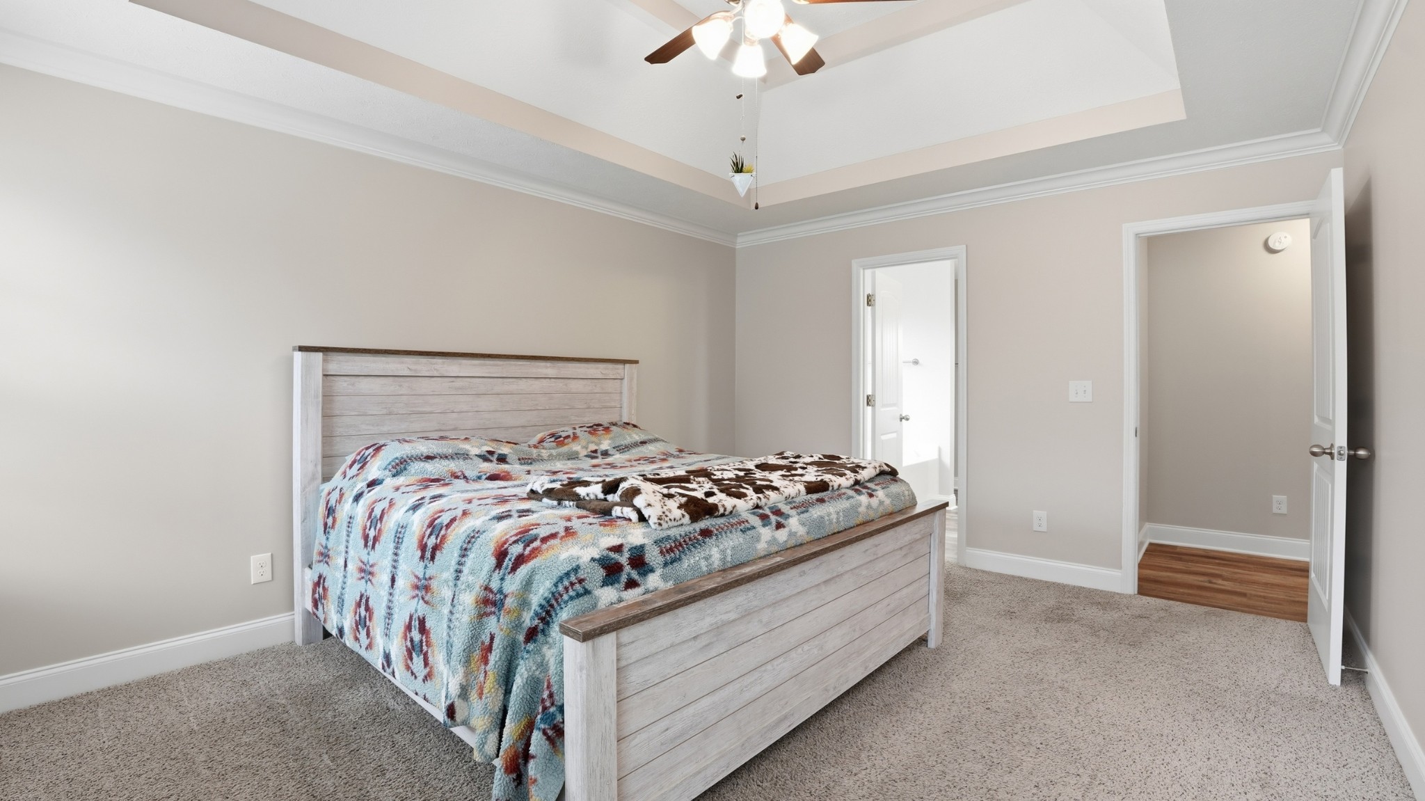 2422 Turtle Trace Murfreesboro, TN 37127 - Photo 5 of 38 a bedroom with a bed and a chandelier