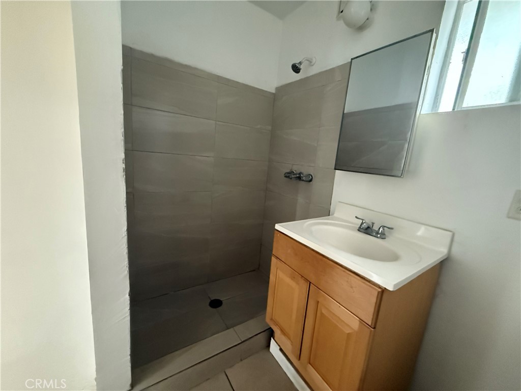 1946 Bryce Road South El Monte, CA 91733 - Photo 5 of 9 a bathroom with a sink toilet and shower