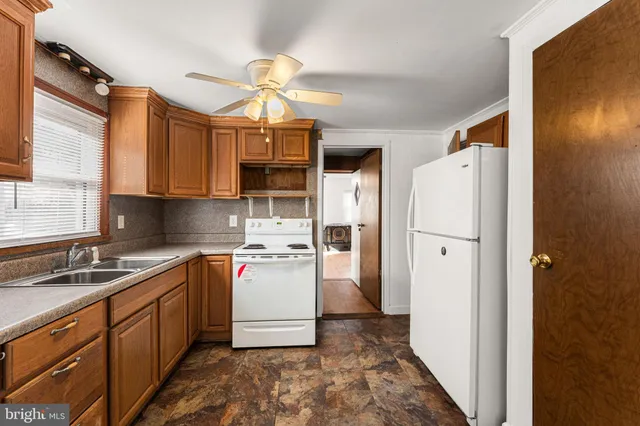a bedroom with furniture and window