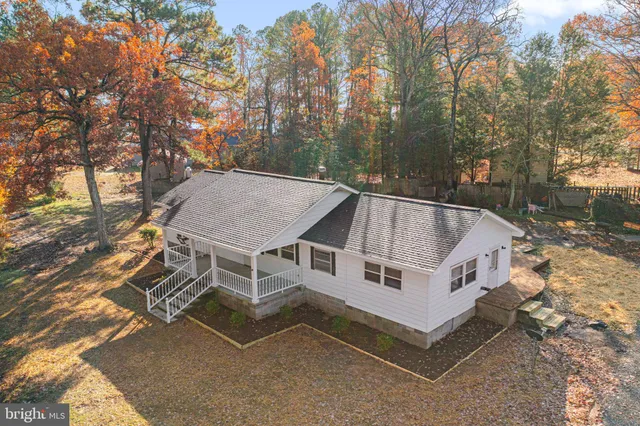 a house with trees in front of it