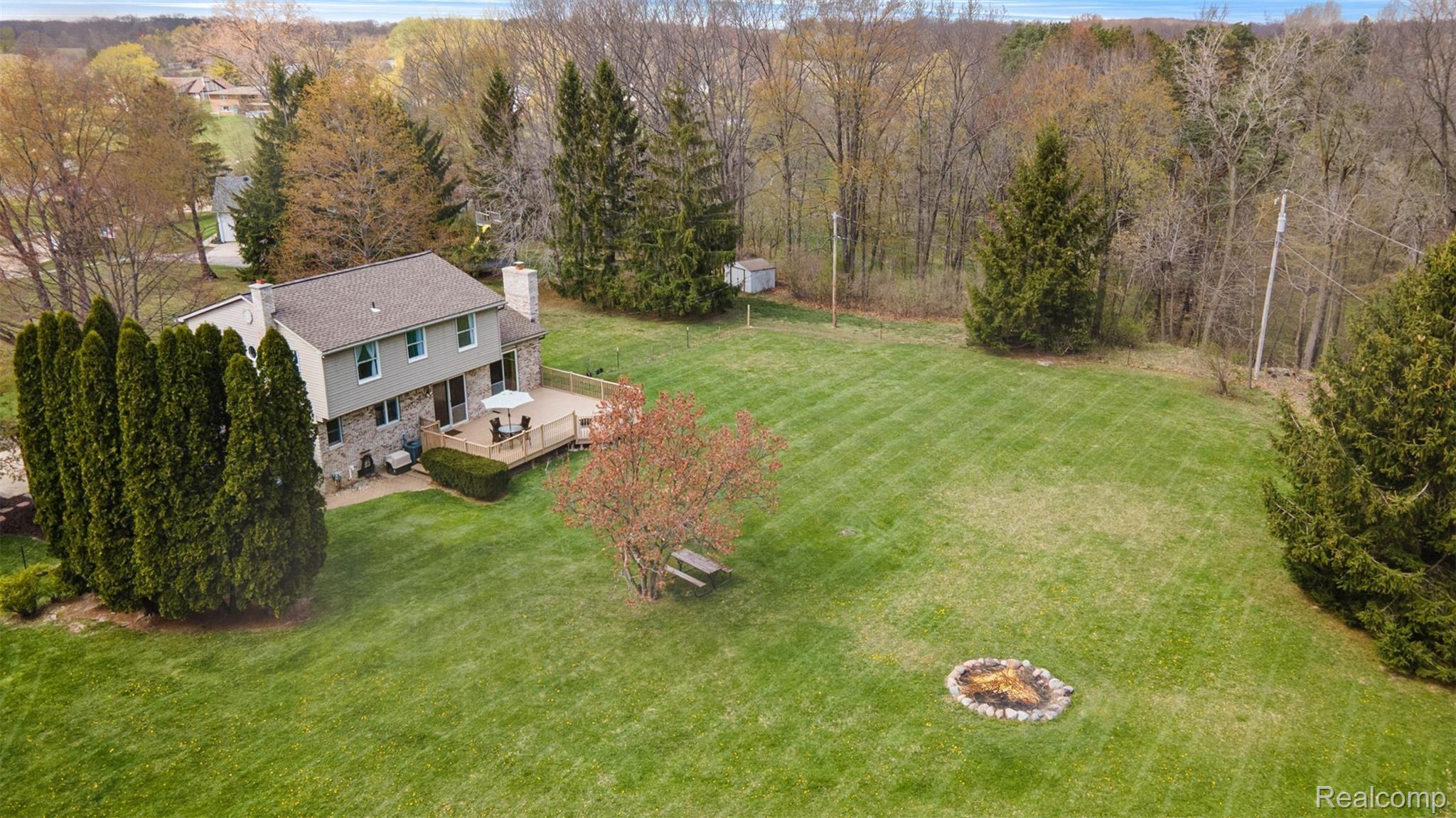 1860 Echo Hills Road Howell, MI 48855 - Photo 22 of 25 so much room to spread out in this backyard