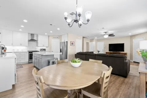 a view of a dining room with furniture window and outside view