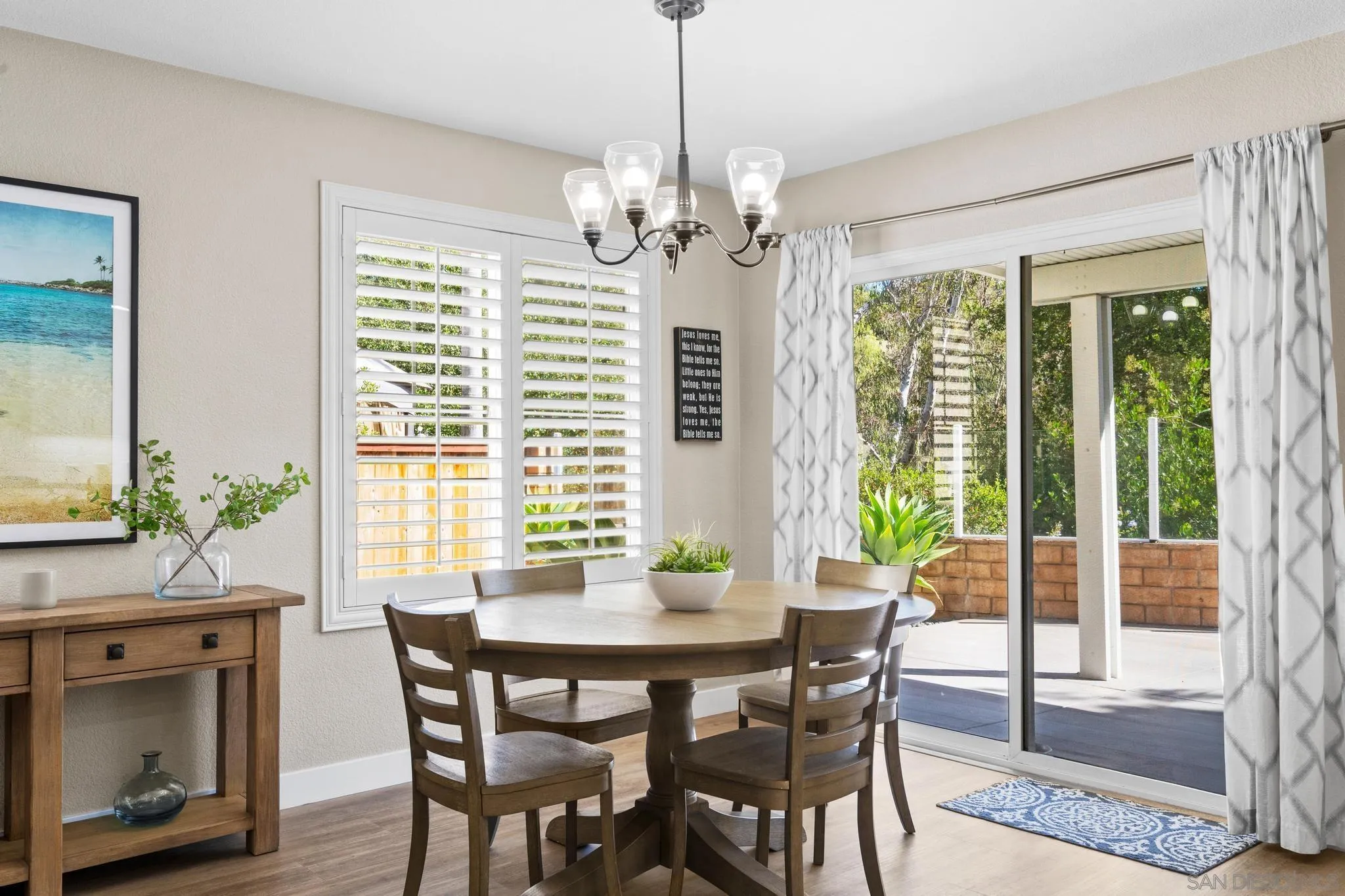 1942 Arbor Glen Escondido, CA 92025 - Photo 12 of 25 a view of a dining room with furniture window and outside view