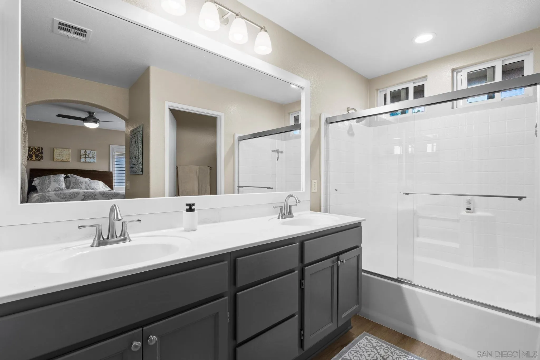 1942 Arbor Glen Escondido, CA 92025 - Photo 16 of 25 a bathroom with a double vanity sink mirror and double