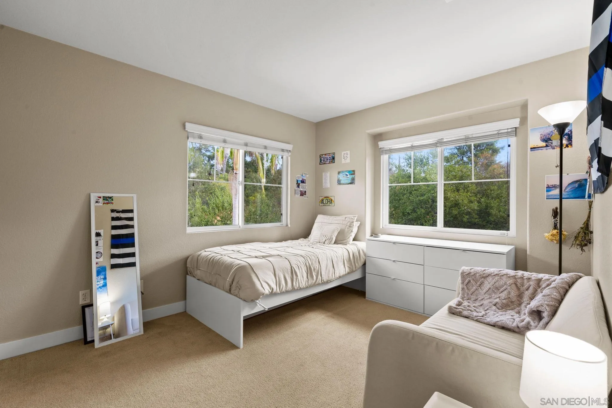 1942 Arbor Glen Escondido, CA 92025 - Photo 19 of 25 a bedroom with furniture and a large window