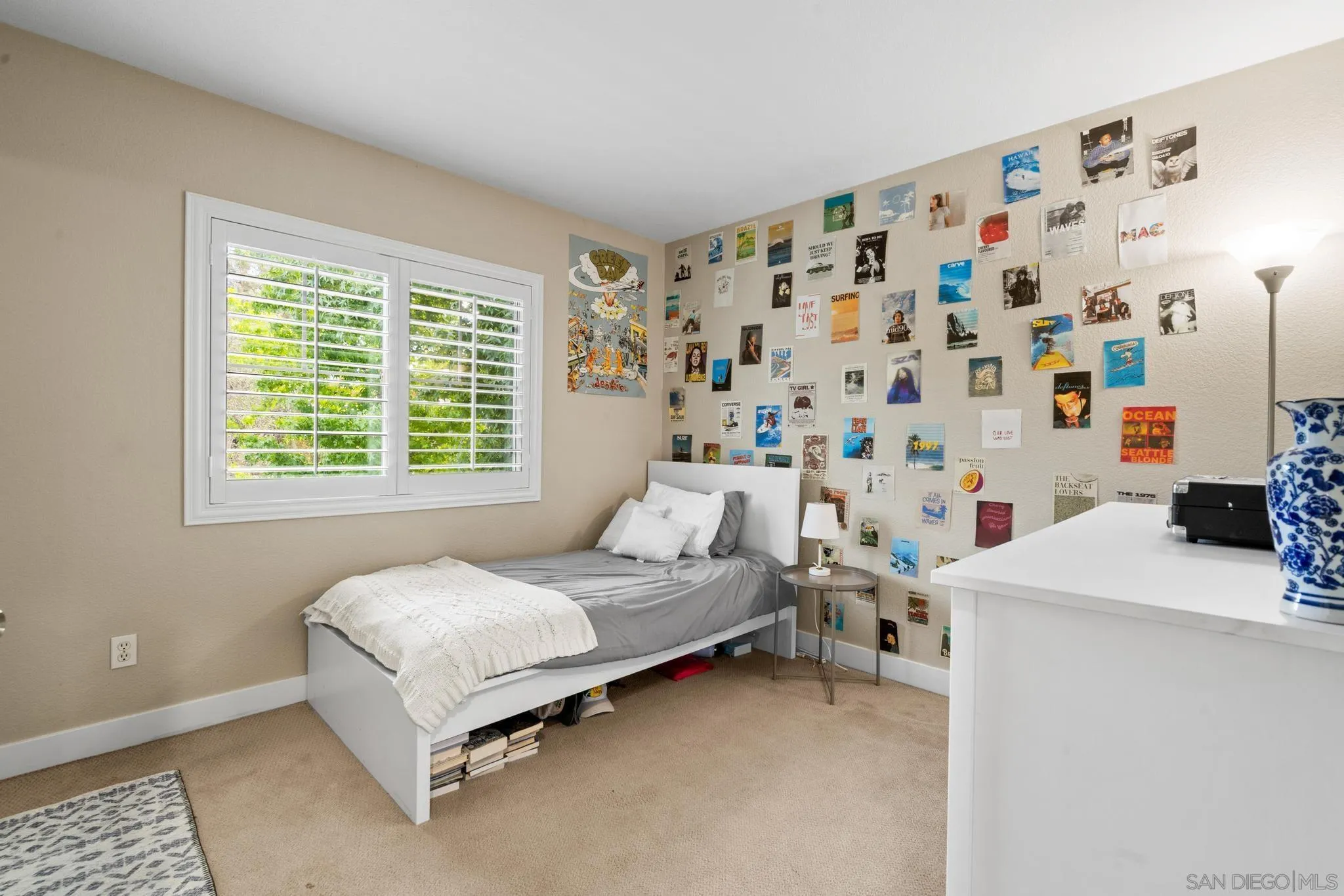 1942 Arbor Glen Escondido, CA 92025 - Photo 21 of 25 a bedroom with a bed and a window