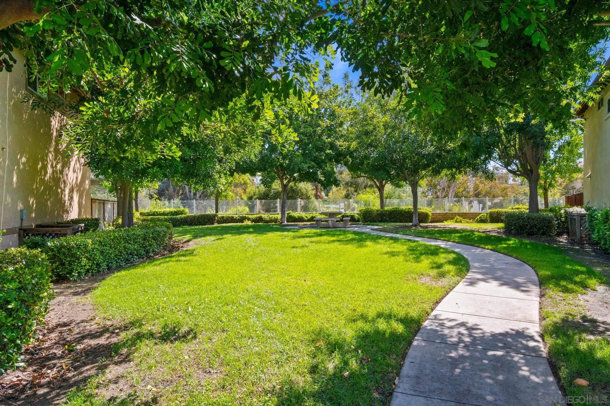 1942 Arbor Glen Escondido, CA 92025 - Photo 25 of 25 a house with swimming pool in front of it