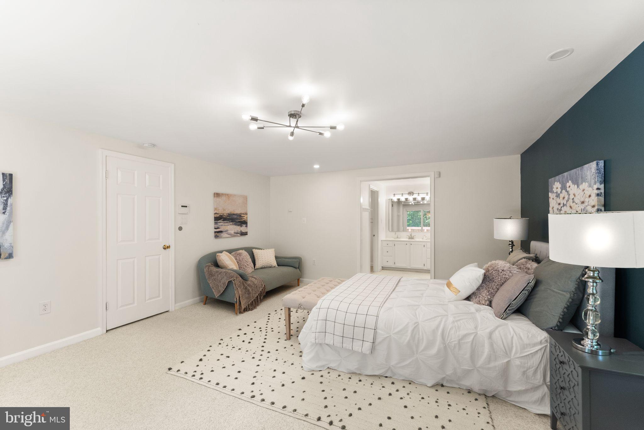 38620 Lime Kiln Road Leesburg, VA 20175 - Photo 30 of 87 a bedroom with a bed and a lamp on dresser