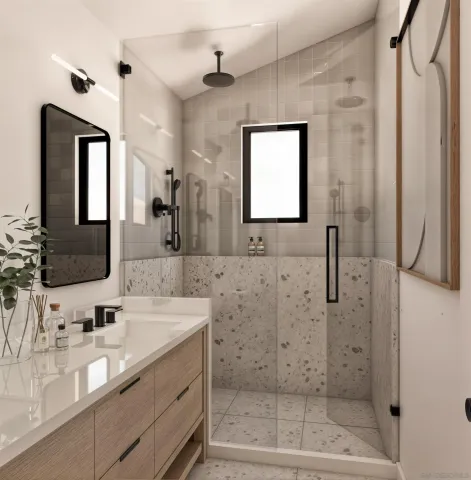 a bathroom with a shower sink and mirror