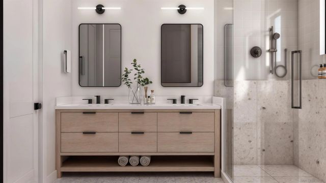a bathroom with double vanity sink two mirror and shower