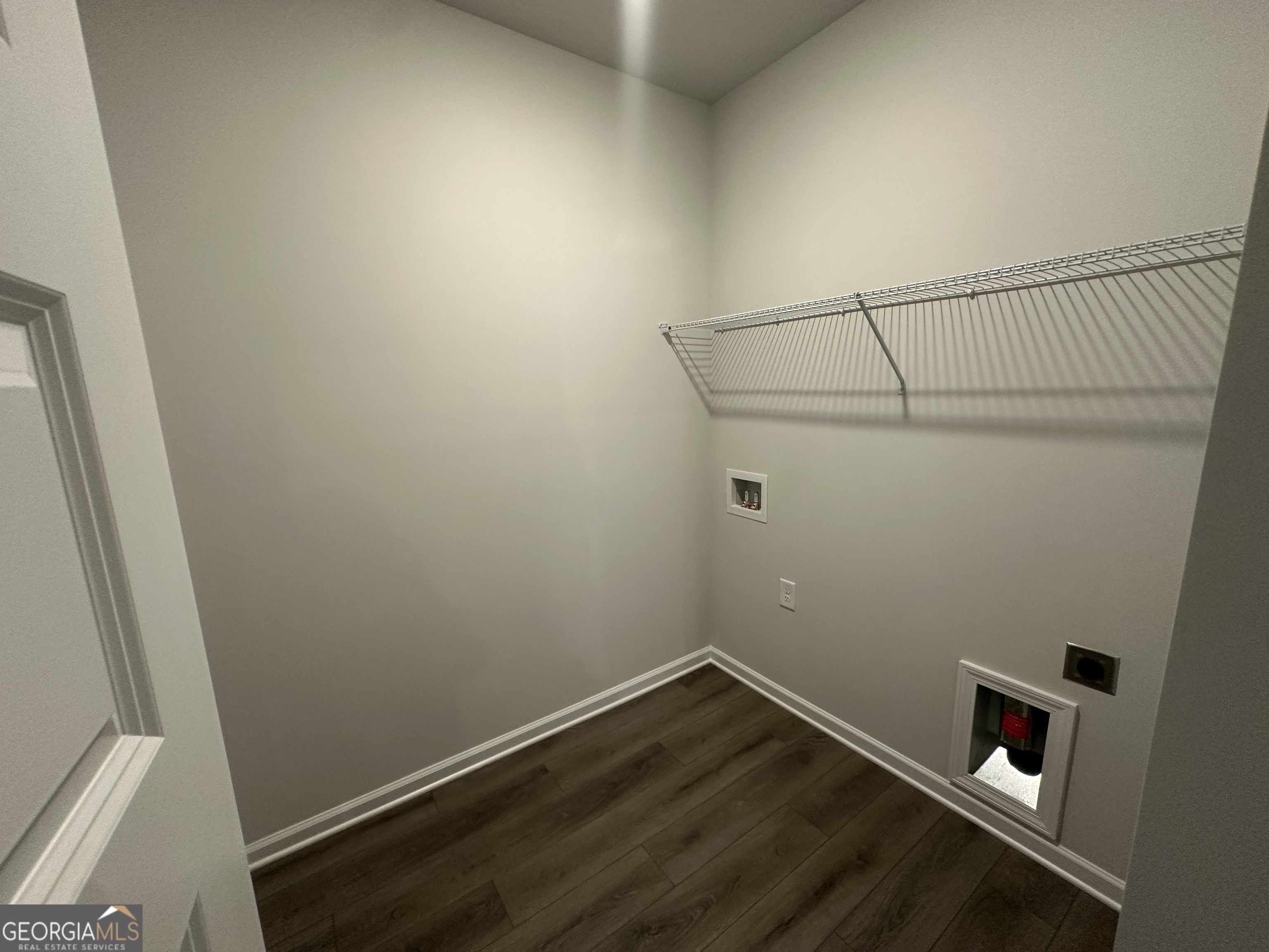 17 Butternut Way, Unit 118B Auburn, GA 30011 - Photo 17 of 53 a view of storage and utility room with wooden floor