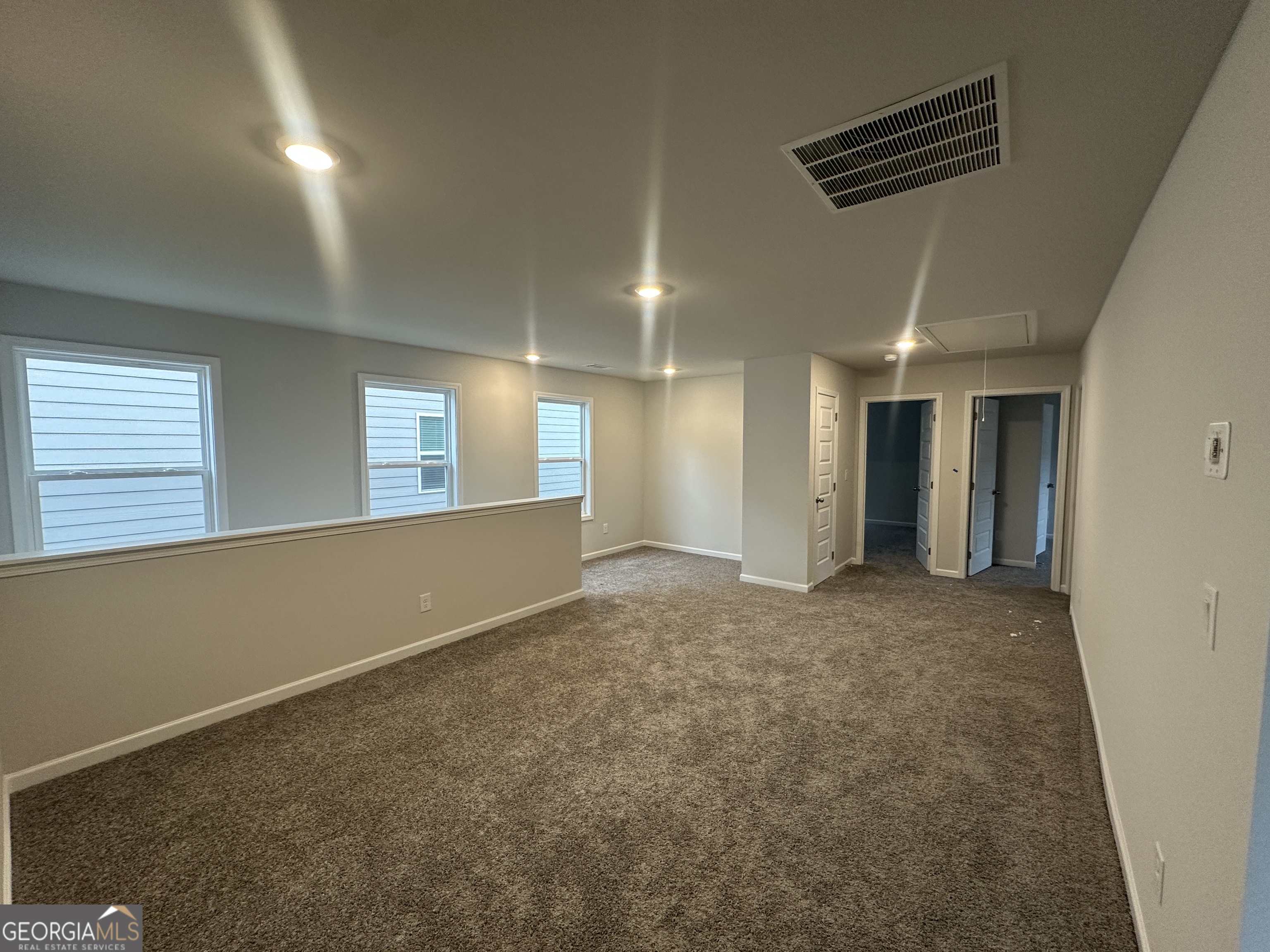 17 Butternut Way, Unit 118B Auburn, GA 30011 - Photo 23 of 53 a view of an empty room with a window