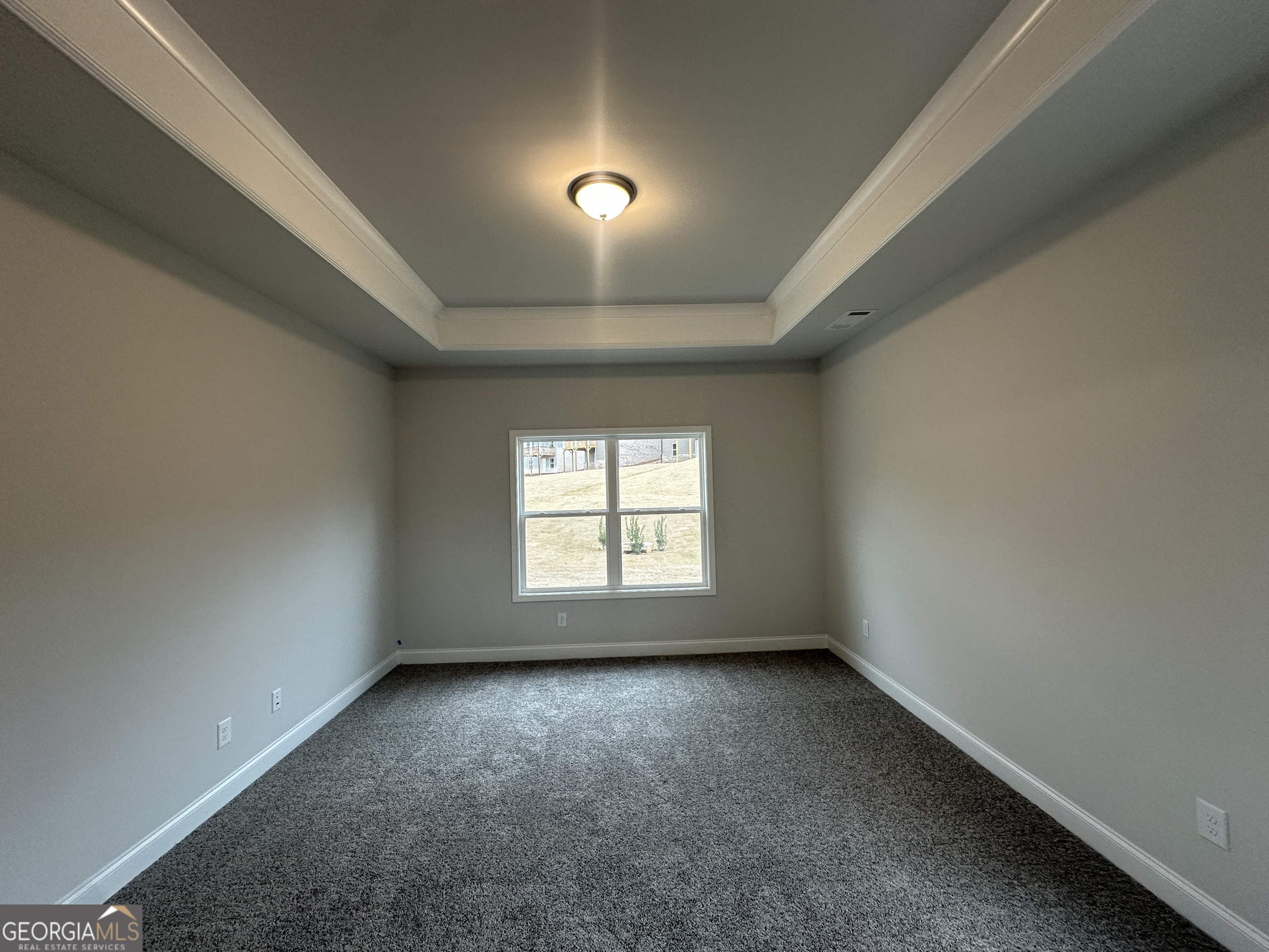 17 Butternut Way, Unit 118B Auburn, GA 30011 - Photo 10 of 53 an empty room with a empty space and windows