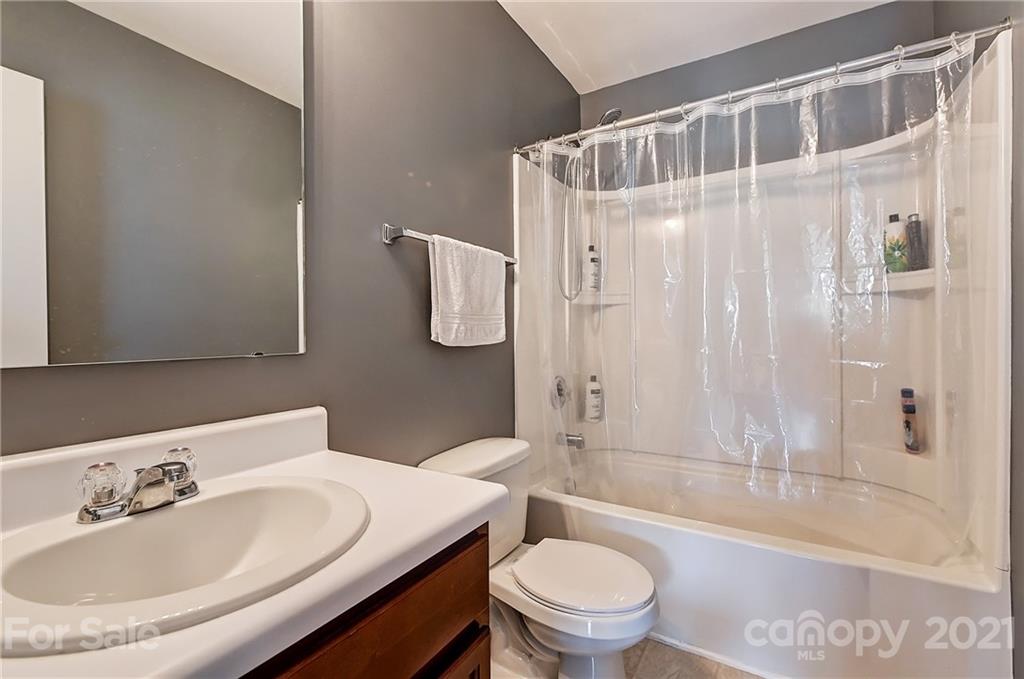 923 Rook Road Charlotte, NC 28216 - Photo 27 of 36 a bathroom with a sink toilet and shower