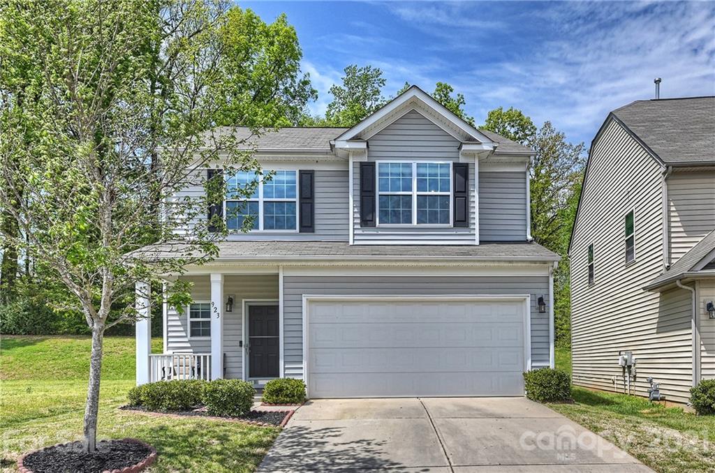 923 Rook Road Charlotte, NC 28216 - Photo 35 of 36 a front view of a house with a yard