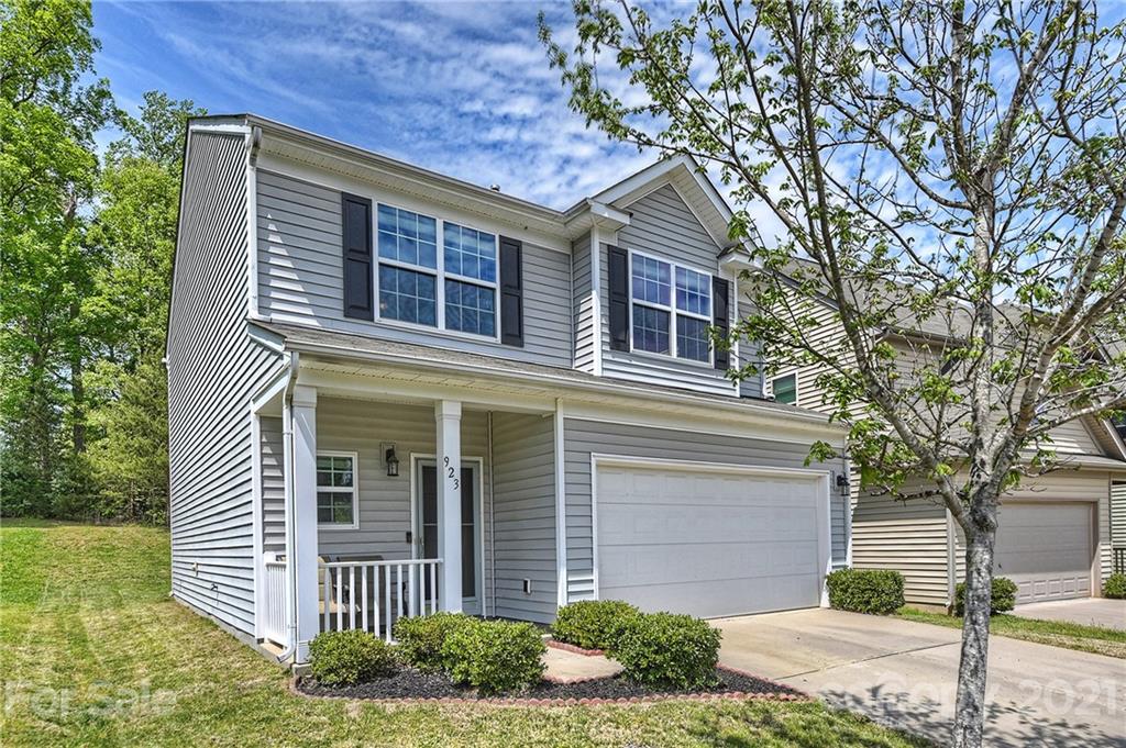 923 Rook Road Charlotte, NC 28216 - Photo 36 of 36 a front view of a house with garden