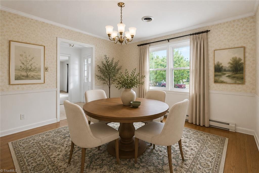 626 Kenneth Road Greensboro, NC 27455 - Photo 5 of 34 Digitally enhanced. Dining room off foyer