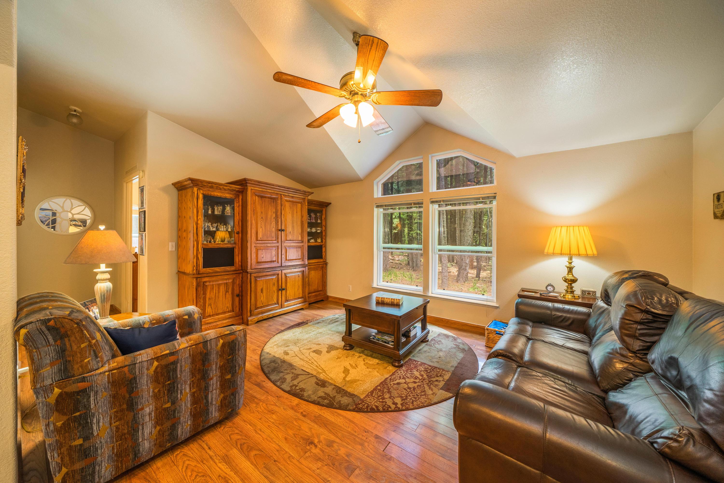 34739 Timber Ridge Road Shingletown, CA 96088 - Photo 6 of 26 a living room with furniture and a window