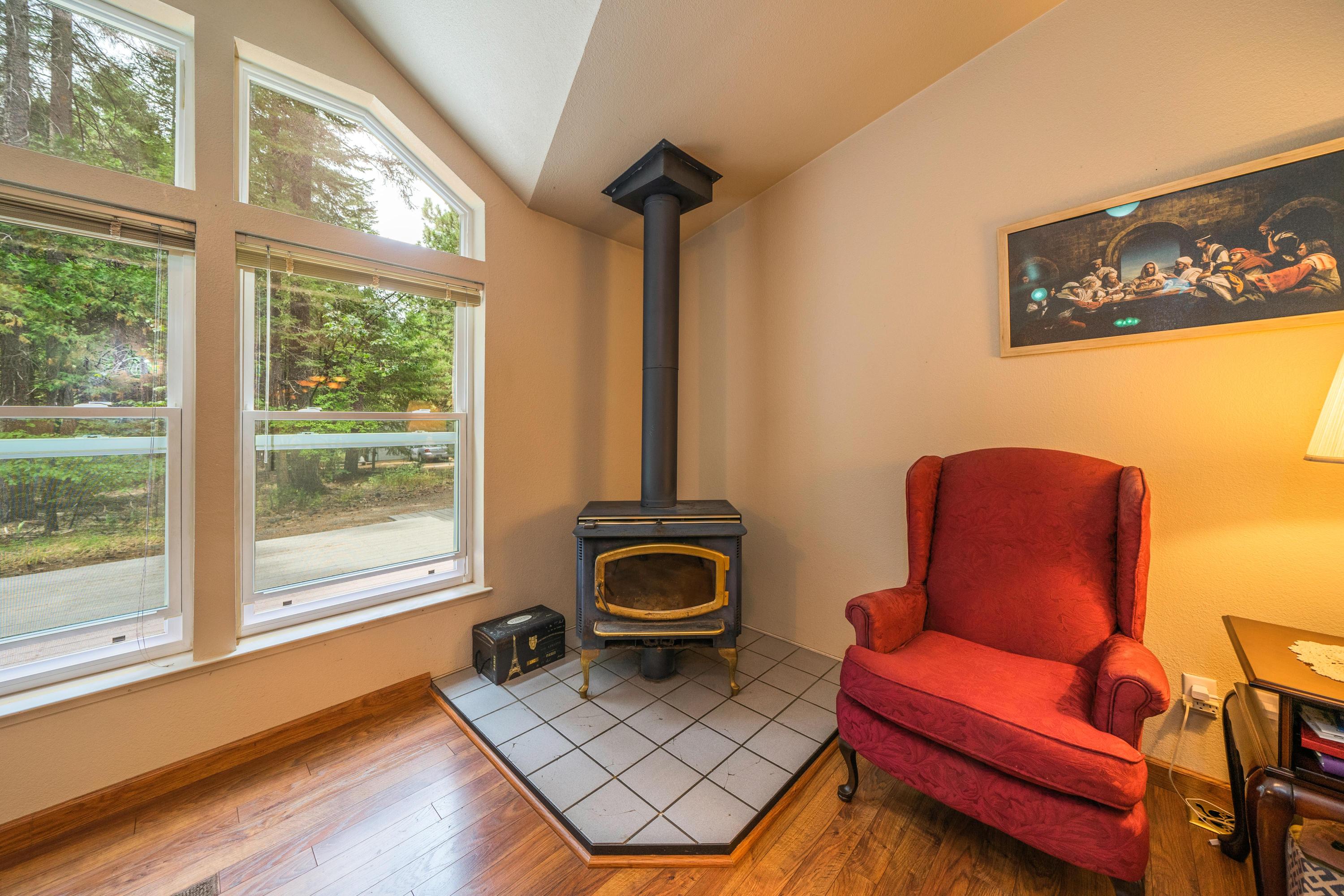 34739 Timber Ridge Road Shingletown, CA 96088 - Photo 8 of 26 a living room with furniture and a large window