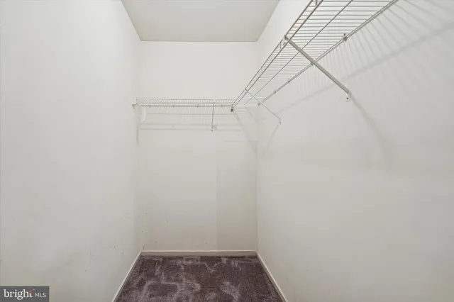 a view of a room with racks on the wall