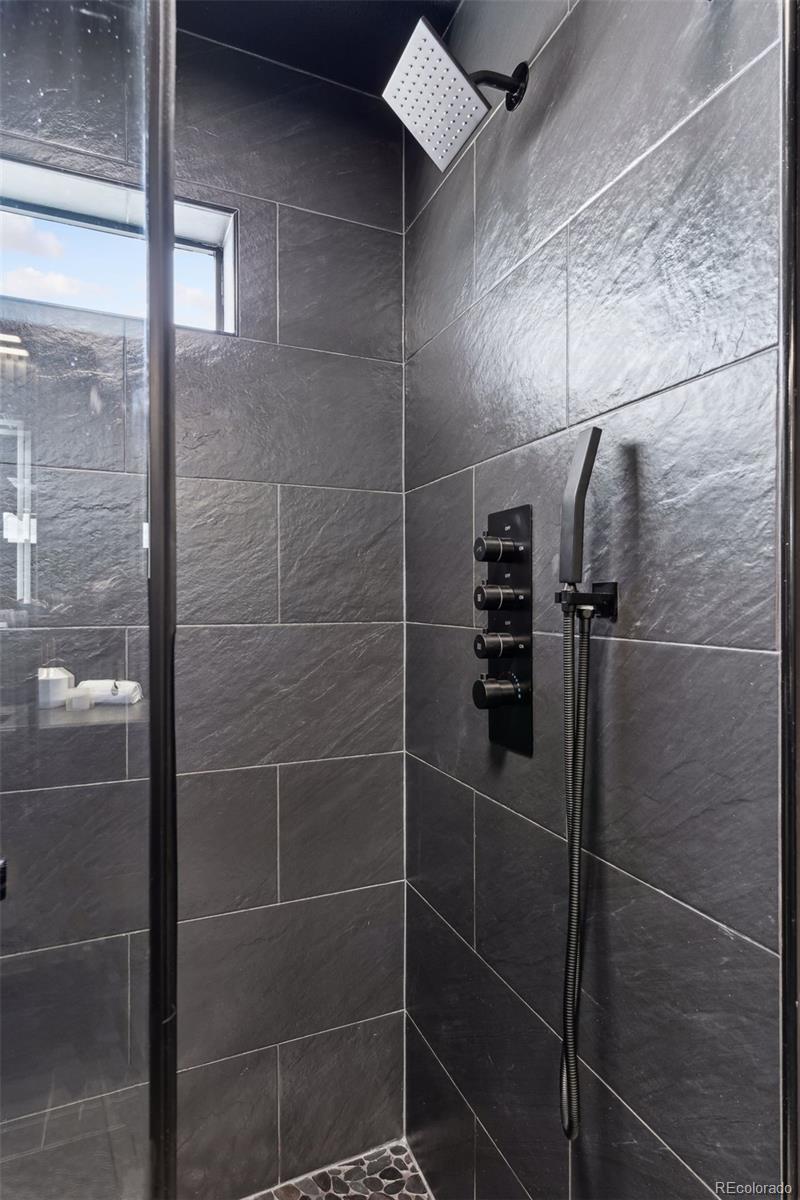 23913 East Minnow Circle Aurora, CO 80016 - Photo 40 of 49 a bathroom with a shower