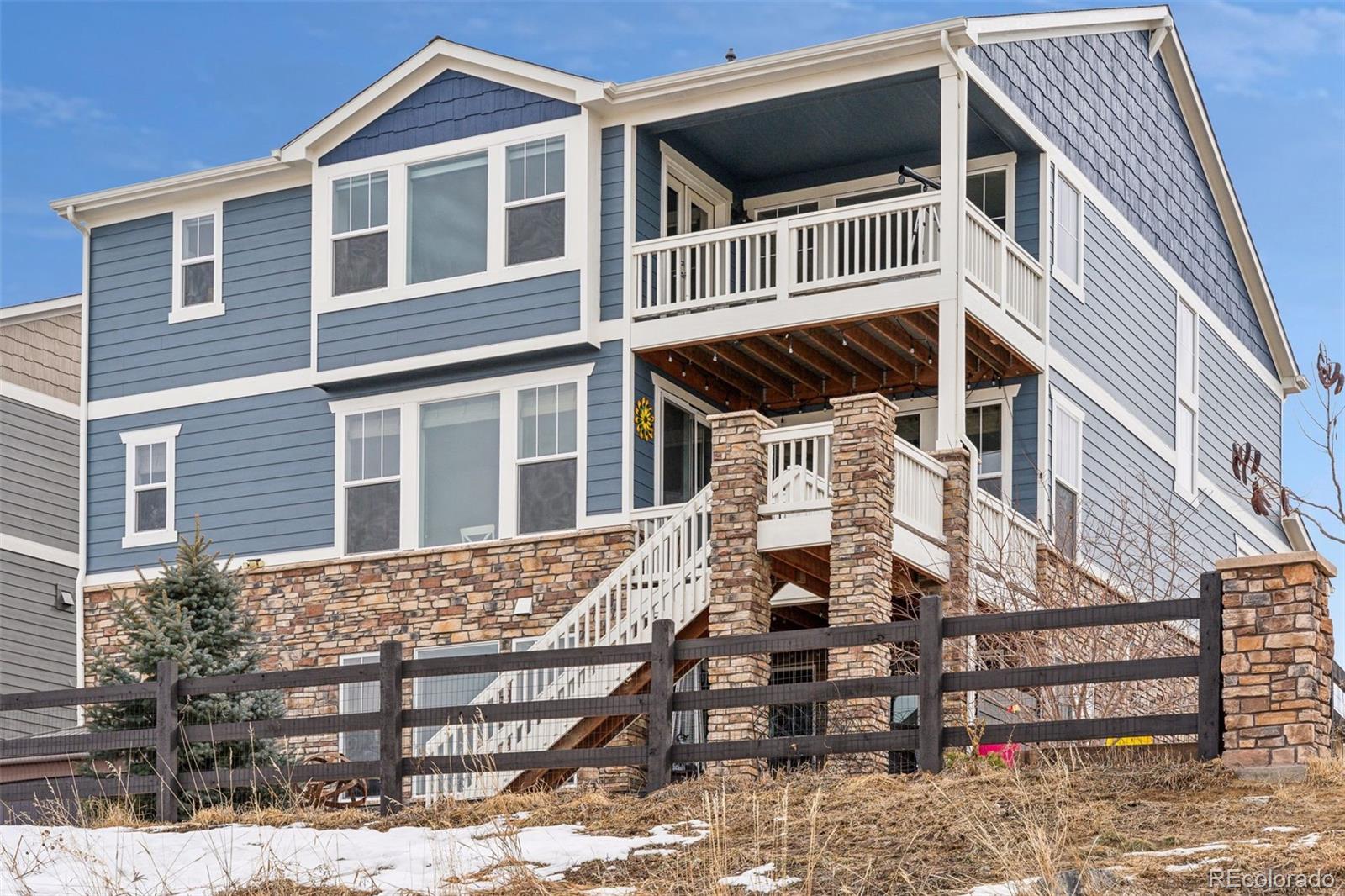 23913 East Minnow Circle Aurora, CO 80016 - Photo 45 of 49 a front view of a house with a yard