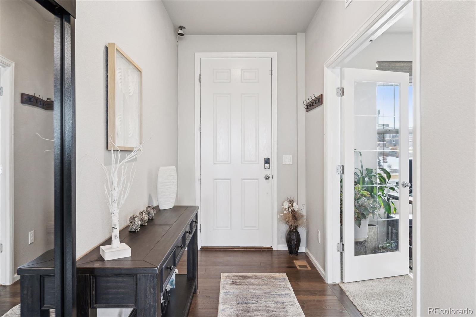 23913 East Minnow Circle Aurora, CO 80016 - Photo 6 of 49 a bathroom with a sink and a mirror